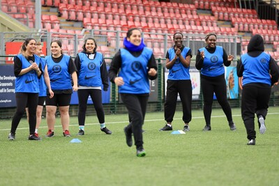Creating opportunities for women to engage with football in a supportive and inclusive environment (PRNewsfoto/Surrey-FA)