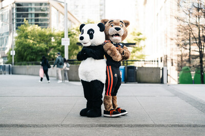 WWF's Climb for Nature is coming to BC Place on May 26. Leo the Lion welcomed the WWF panda mascot on Earth Day with a friendly stair climb competition. (c) Garret Corson/WWF-Canada (CNW Group/World Wildlife Fund Canada)