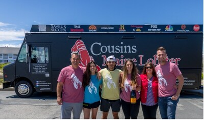 Co-Founder of Cousins Maine Lobster Jim Tselikis, Franchisees Todd Nelson, Tara Nelson, TJ Nelson, and family celebrate the launch of their second Boston truck on June 18 th, 2022, at Smugglers Beach, Yarmouth, MA.