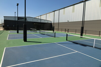Hellas poured close to 25,000 square feet of 5” thick post-tensioned concrete slabs, which included striping for 12 USAP regulated courts at TOPSEED Pickleball. Hellas also installed nearly 200 linear feet of 8” tall vinyl-coated chain link fencing, plus nets and posts for 9 indoor and 3 outdoor pickleball courts.