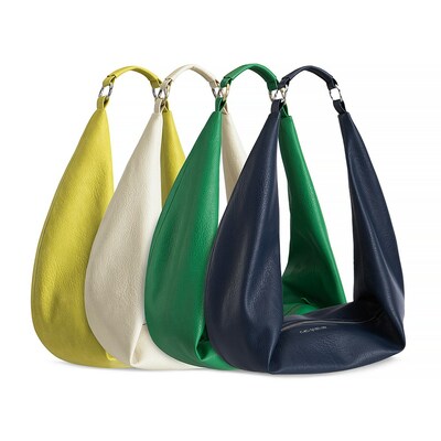 Carla Rockmore's Sling Bag 2.0 has four color options: Lime, Parchment, Emerald, and Navy. This fashionable and functional bag comes with an adjustable strap and a matching wristlet.
