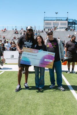 Gracie, a Taco Bell team member, was thrilled when her idol, Davante Adams, presented her with a $25,000 Live Ms Scholarship at his football camp. She plans to use it to study business management and marketing, aiming to pave the way for women in sports management.
