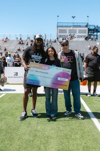 Gracie, a Taco Bell team member, was thrilled when her idol, Davante Adams, presented her with a $25,000 Live Más Scholarship at his football camp. She plans to use it to study business management and marketing, aiming to pave the way for women in sports management.