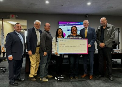 The Ontario International Airport Authority Board of Commissioners presents a check for $32,079.11 to the USO. The money represents net proceeds from ONT's 2nd Annual 5k at the Runway.
