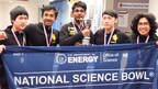 Aldric Benalan (center) with the Science Bowl Championship trophy.