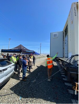 SunTrain Founder and CTO, Christopher Smith, explains the containerized battery technology to the demo attendees. Photo Courtesy of SunTrain.