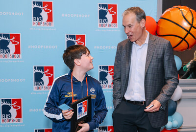 2024 Hoop Shoot Keynote Speaker and Head Coach of the Northwestern Men's Basketball Team Chris Collins posed for photos and traded personalized trading cards with the Hoop Shoot competitors.