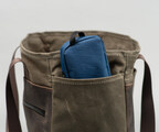 Store the Magnetic Cycling Case in the side pocket on the way to your ride.