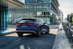 Audi Q8 with digital Atala OLED rear lighting in a cityscape. Courtesy of Audi.