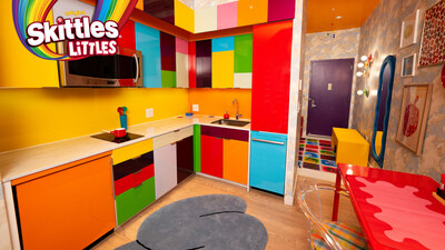 SKITTLES® Littles Living – a maximized yet micro, rainbow-filled apartment designed by decorator Dani Klarić – is shaking up NYC to give one lucky fan the chance to not only “Taste The Rainbow,” but live in it too with rent paid for one year by SKITTLES.
