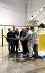 Ribbon Cutting Ceremony : The introduction of a state-of-the-art robotic arm that packages 50-pound bags of EZ Street Ambient® Asphalt.