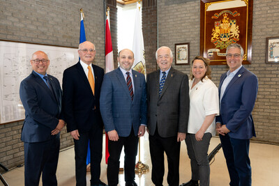 Director General Patrice Boileau, and the members of the Council, Roger Moss, Robert Mercuri, Georges Bourelle (mayor), Dominique Godin, and David Newell. Absent: Martin St-Jean and Peggy Alexopoulos (CNW Group/City of Beaconsfield)