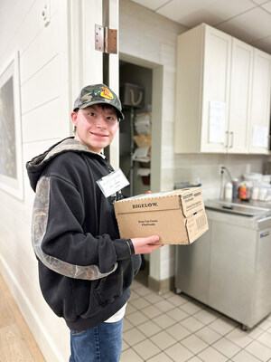 Latham Center Student Delivering Packages to Maplewood Residents