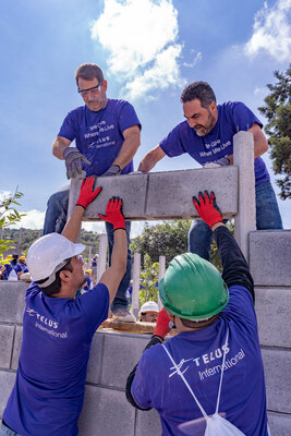 TELUS International team members participating in a TELUS Days of Giving event, giving where they live, in Guatemala. (CNW Group/TELUS Communications Inc.)