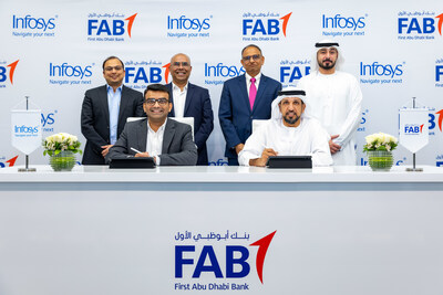 Infosys signs a strategic collaboration agreement with First Abu Dhabi Bank. Signatories (bottom row L-R): Dennis Gada, Executive Vice President and Global Head of Banking & Financial Services, Infosys and Suhail Bin Tarraf, Group Chief Operating Officer, FAB.