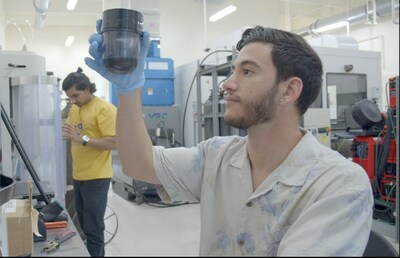 Brandon Aguiar, a graduate student at Florida International University, works to prepare a slurry containing a lunar regolith simulant, graphene nanoplatelets, and base resin for use in FIU's ongoing study of the enhanced electrical conductivity of additively manufactured lunar regolith components involving graphene nanoplatelets.