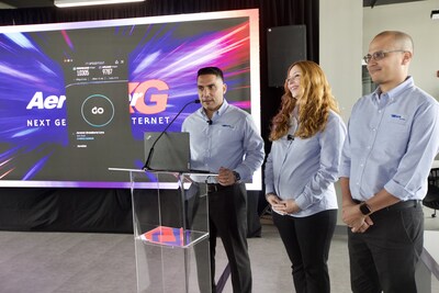 Gino Villarini, founder and president of AeroNet, performs a speed test of the new AeroFiberXG with Teremarih Rivera, Account Executive, and Luis Cintrn, Senior Network Engineer.