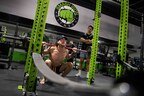 Client Squatting With Barbell
