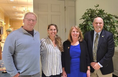 Left to right: Rich Hutchins, OC RV show promoter; Jennifer Evans, OC RV Show Marketing Director. Senator Mary Beth Carrozza. Larry Noccolino, executive director of the Roland E. Powell Convention Center.