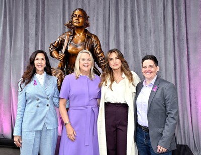 Mariska Hargitay teamed up with Purina in support of the Purple Leash Project to unveil a new statue, “Courageous Together,” showcasing a woman and her dog taking a first step as survivors leaving abuse, created by “Fearless Girl” artist Kristen Visbal. Pictured from left to right: Artist Kristen Visbal, Purina CEO Nina Leigh Krueger, actress and advocate Mariska Hargitay and RedRover president and CEO Katie Campbell.