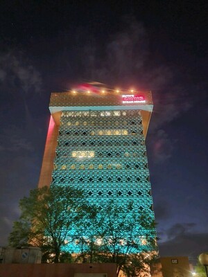 Wright Tower in Louisville, KY illuminated for Turquoise Takeover.