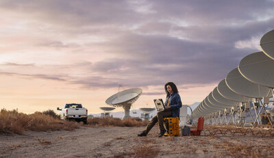 An Army Civilian satellite engineer works at an expansive satellite array in the Department of the Army's 