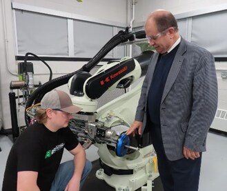 Professor Emad Tanbour works with Tyler Werth, a mechanical engineering student, in the Coherix 3D computer-vision and virtual-reality lab at Eastern Michigan University in Ypsilanti, Michigan.