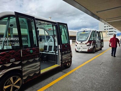 Beep Wiki Wiki shuttles awaiting passenger riders at the Daniel K. Inouye International Airport (HNL) in Honolulu.