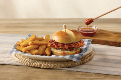 New this summer to Cracker Barrel - the Bee Sting Chicken Sandwich featuring a crispy chicken sandwich drizzled with a sweet-heat honey glaze, pickles, and mayo. Served with a Country Side.