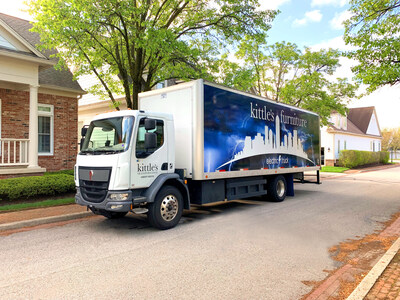 The Kittle's Furniture Kenworth K270E battery-electric delivery truck pauses at Fort Benjamin Harrison in Indianapolis.