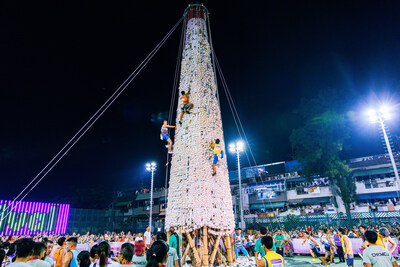 The Cheung Chau Bun Festival will be held on May 15-16. This colourful procession sets the stage for the much-anticipated Bun Scrambling Competition. (CNW Group/Hong Kong Tourism Board)