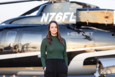 Allison Rakun pictured in front of one of Helinet Aviation's Sikorsky S76 helicopters.