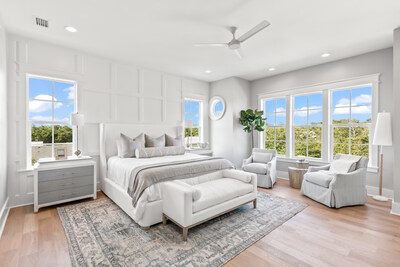 The primary bedroom suite (shown here) is one (1) of the residence's six (6) bedrooms. The property is selling furnished, and can comfortably accommodate up to 20 overnight guests, providing appeal to those property investors wishing to take advantage of the area's consistently robust vacation rental market. OceansideLuxuryAuction.com.