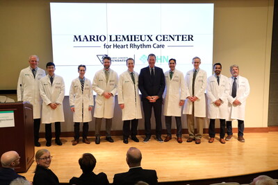 Physicians from Allegheny Health Network's electrophysiology program stand with Mario Lemieux