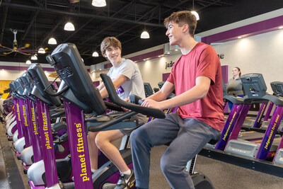Teens using Exercise Bikes at Planet Fitness