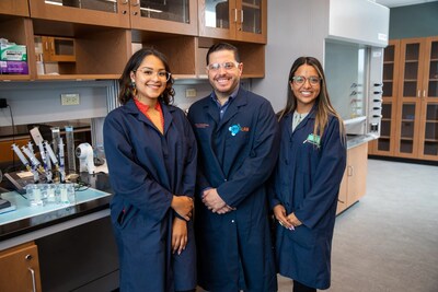 A photo of a team of researchers from the University of Puerto Rico-Ro Piedras while working to discover a more efficient water recycling system for use on space missions. The team is comprised of doctoral students Liz Santiago-Martoral, on the left, and Alondra Rodriguez-Rolon, and their mentor Professor Eduardo Nicolau. One of their experiments can be seen on the countertop to the left of the group. Credits: NASA