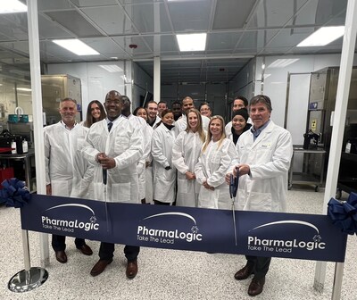 Steve Chilinski, CEO of PharmaLogic, and various team members cut the ceremonial ribbon to signify the opening of PharmaLogic NYC.