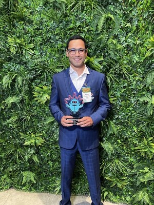 Anand S. accepting the award.