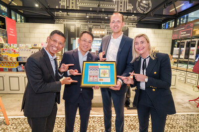 From left to right: SingPost CEO Singapore Shahrin Abdol Salam and SingPost CEO International Li Yu presented a token of appreciation to Lithuanian Minister of Transport and Communications Marius Skuodis and Deputy Minister Agnė Vaiciukevičiūtė at SingPost Centre’s Philatelic Store.