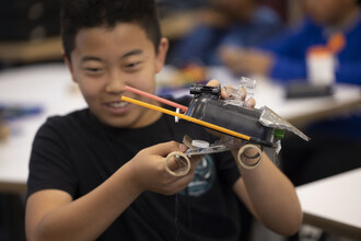 A student presents his team’s future mobility vehicle using reclaimed and upcycled materials during the workshop hosted by Genesis and Child Creativity Lab at the TGR Learning Lab in Anaheim, Calif. on May 6, 2024. (Photo/Genesis)
