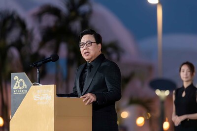 Sands China Ltd. Executive Vice Chairman Dr. Wilfred Wong speaks at Sands Macao’s 20th anniversary celebration Thursday at the hotel and entertainment complex’s outdoor fountain.
