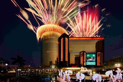 A dazzling pyrotechnic display in front of Sands Macao's facade Thursday illuminates the night in front of the hotel and entertainment complex's outdoor fountain in celebration of the property's 20th anniversary. It was fully choreographed to a musical score, providing lively entertainment for invited guests, local residents, and visitors.