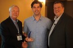 Justin Nucci of Tbaytel (center) accepts the Provider Marketing Award from Ellis Hill (left) and Charlie Conway of ResearchFirst (right).