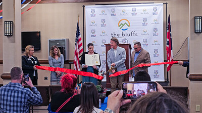 Dr. Brian Wind cutting the ribbon at the ribbon-cutting ceremony for Your Six Recovery, the new veterans addiction treatment program, at The Bluffs Addiction Campuses.