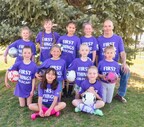 Coach Devaney with daycare soccer team