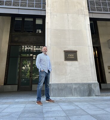 METIS Intelligence - Executive VP / Chief Strategy & Innovation Officer stands outside the new North America Headquarters at 1500 K Street, the historical Southern Railway Building, located in the bustling downtown neighborhood of Washington, DC, a few blocks away from the White House.