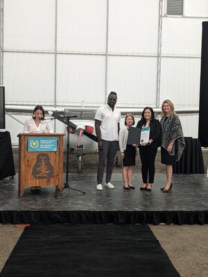 Dwayne Locke, Audrey Le and Jenny Quianzon are a part of the Centennial College team that received a Minister's Award of Excellence from Minister of Colleges and Universities Jill Dunlop for their work on the Early Childhood Education - Tropicana program. (CNW Group/Centennial College)