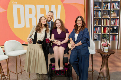 Hosts of "The Drew Barrymore Show," Drew Barrymore and Ross Mathews, together with the Elevate Prize Foundation CEO, Carolina García Jayaram, surprise Stephanie Woodward of Disability EmpowHer Network with the March Elevate Prize GET LOUD Award for work in Women’s Empowerment. Pictured from left to right: Barrymore, Mathews, Woodward, and García Jayaram.
