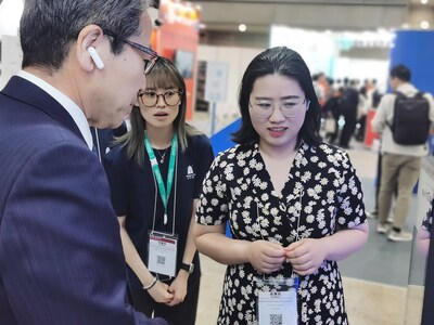 Mr. Masato Yasuda, the Executive Managing Director of the Japanese Association for the Promotion of International Trade (JAPIT) visits Timekettle's booth