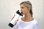 Person drinking from the 22 oz MagicMount Flask